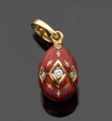 Fabergé egg pendant, 18ct gold comprising translucent red guilloche enamel, grain set to the front