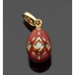 Fabergé egg pendant, 18ct gold comprising translucent red guilloche enamel, grain set to the front