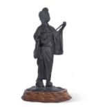 Japanese bronze of a geisha seated on wooden base, 33cm tall
