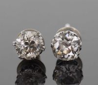 Two Diamond stud earrings, two old cut diamonds, 0.40ct each approx, post fitting
