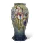 Large mid 20th Century Moorcroft vase of baluster form decorated with orchids and spring flowers,