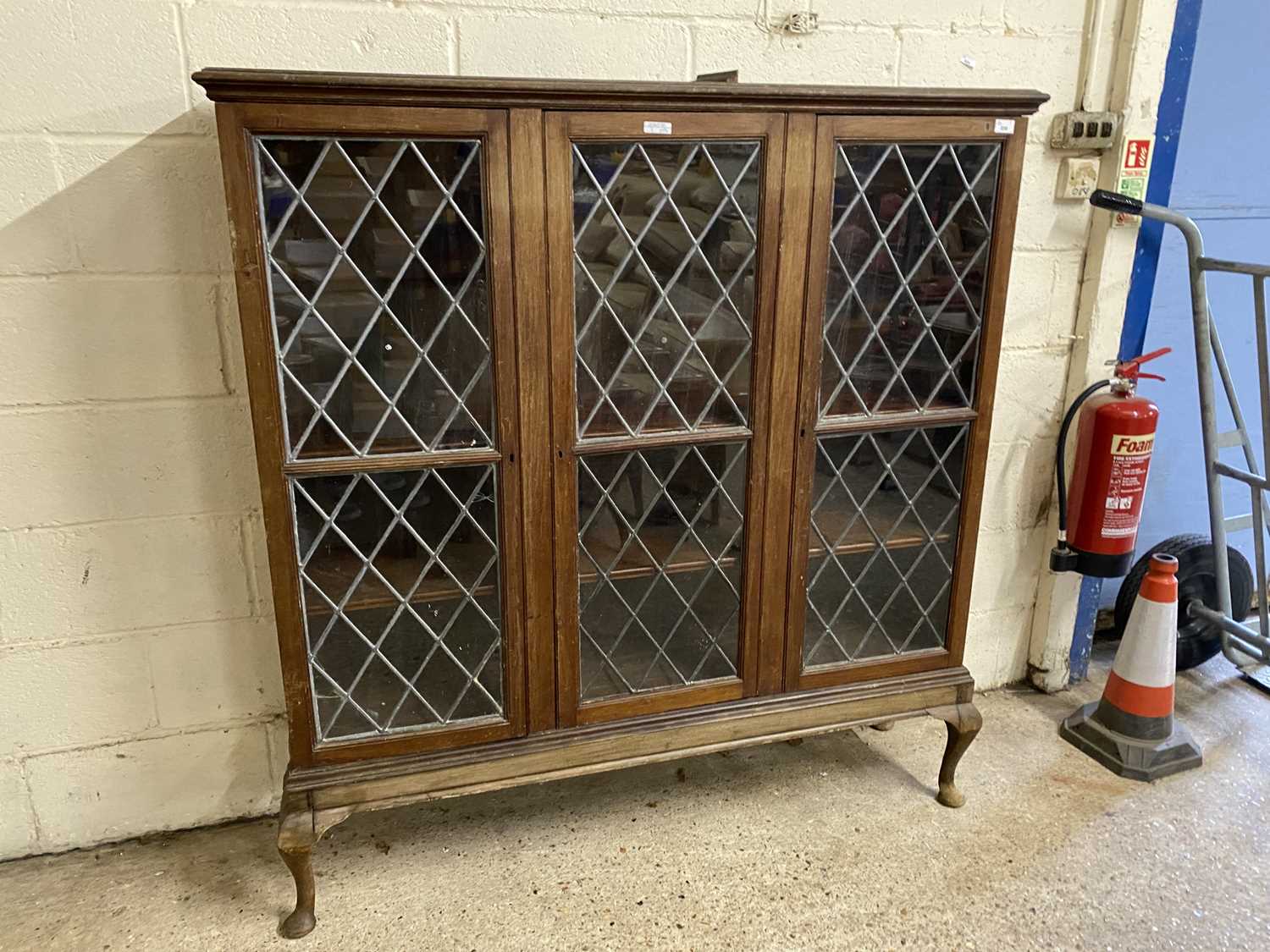 20th Century mahogany and lead glazed three door bookcase cabinet