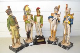 Five resin model soldiers