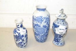 Group of three small Oriental blue and white vases