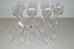 A collection of Stuart crystal hop glasses and liqueur glasses plus others