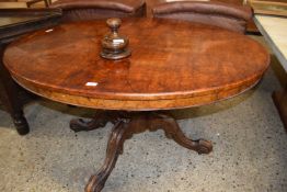 Victorian walnut veneered oval loo table on turned column and four outswept legs, 137cm wide