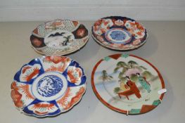 Three various Imari wall plates and one other