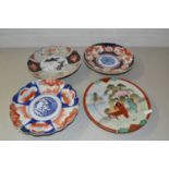 Three various Imari wall plates and one other