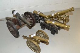 Four brass model cannons and one other (5)