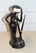 Figural pottery pen stand