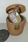 Chinese Canton teapot in wicker carrying case, teapot spout damaged and repaired