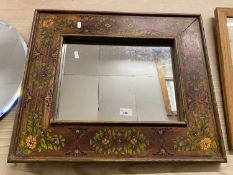 An Indian hardwood framed wall mirror with painted floral decoration
