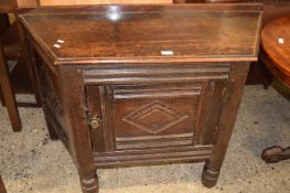 Carved oak lozenge formed side cabinet, 113cm wide