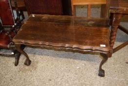 Mahogany coffee table on ball and claw feet, 88cm wide