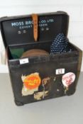 Box containing a Moss Bros brown top hat, various gloves and other items