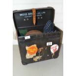 Box containing a Moss Bros brown top hat, various gloves and other items