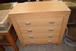 Modern light oak finish four drawer chest