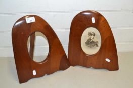 Pair of hardwood picture frames formed from propeller ends