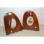 Pair of hardwood picture frames formed from propeller ends