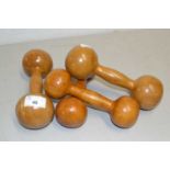 Four wooden dumbells