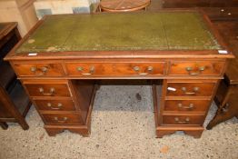 Reproduction yew wood veneered twin pedestal office desk, 121cm wide