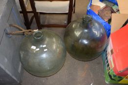 Two large glass carbuoy