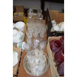 Collection of various drinking glasses, decanters, silver plated serving tray etc