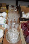 Collection of various drinking glasses, decanters, silver plated serving tray etc