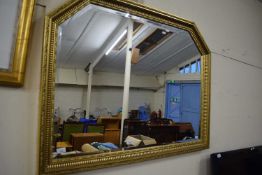 Modern bevelled over mantel mirror in gilt finish frame