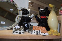 Mixed Lot: Novelty teapot, Tey pottery cottages and a further model duck