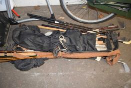 Mixed Lot: Various golf clubs, fishing rods, folding camp bed etc