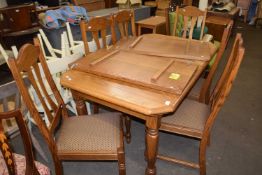 20th Century oak extending dining table together with a set of six accompanying chairs (7)