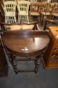 Oak demi lune hall table on turned legs