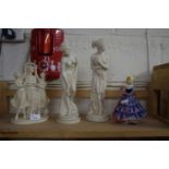 Mixed Lot: Three resin figurines together with a further porcelain model of a lady (4)