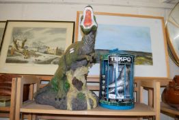 Tekpo robotic parrot together with a large resin model dinosaur