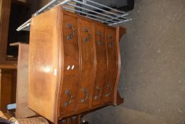 Mahogany veneered serpentine front four drawer chest