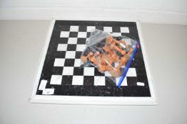 Modern polished stone chess board and pieces