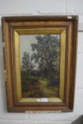 Late 19th Century school study of a figure on a country path, oil on canvas, gilt framed