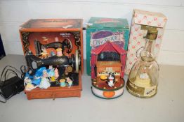 Mixed Lot: Miniature deluxe multi action musical sewing machine, a vintage Bols apricot musical