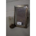 Small silver mounted easel back picture frame together with a dressing table jar (2)