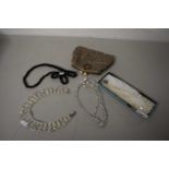 Mixed Lot: Costume necklaces and a small evening bag