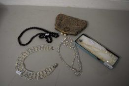 Mixed Lot: Costume necklaces and a small evening bag