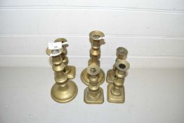 Six various brass candlesticks