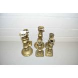 Six various brass candlesticks