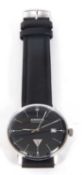 A Junkers authentic gents wristwatch. The watch features a black dial with baton hour markers, the