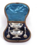 Cased pair of Victorian boat shaped peppers with half fluted decoration, oval bases plus two