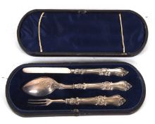 Cased Victorian Christening set comprising knife, spoon and fork, Sheffied 1863, makers mark Martin,