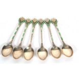 Cased set of six Edward VIII silver and enamelled coffee spoons, the finials each with a white daisy
