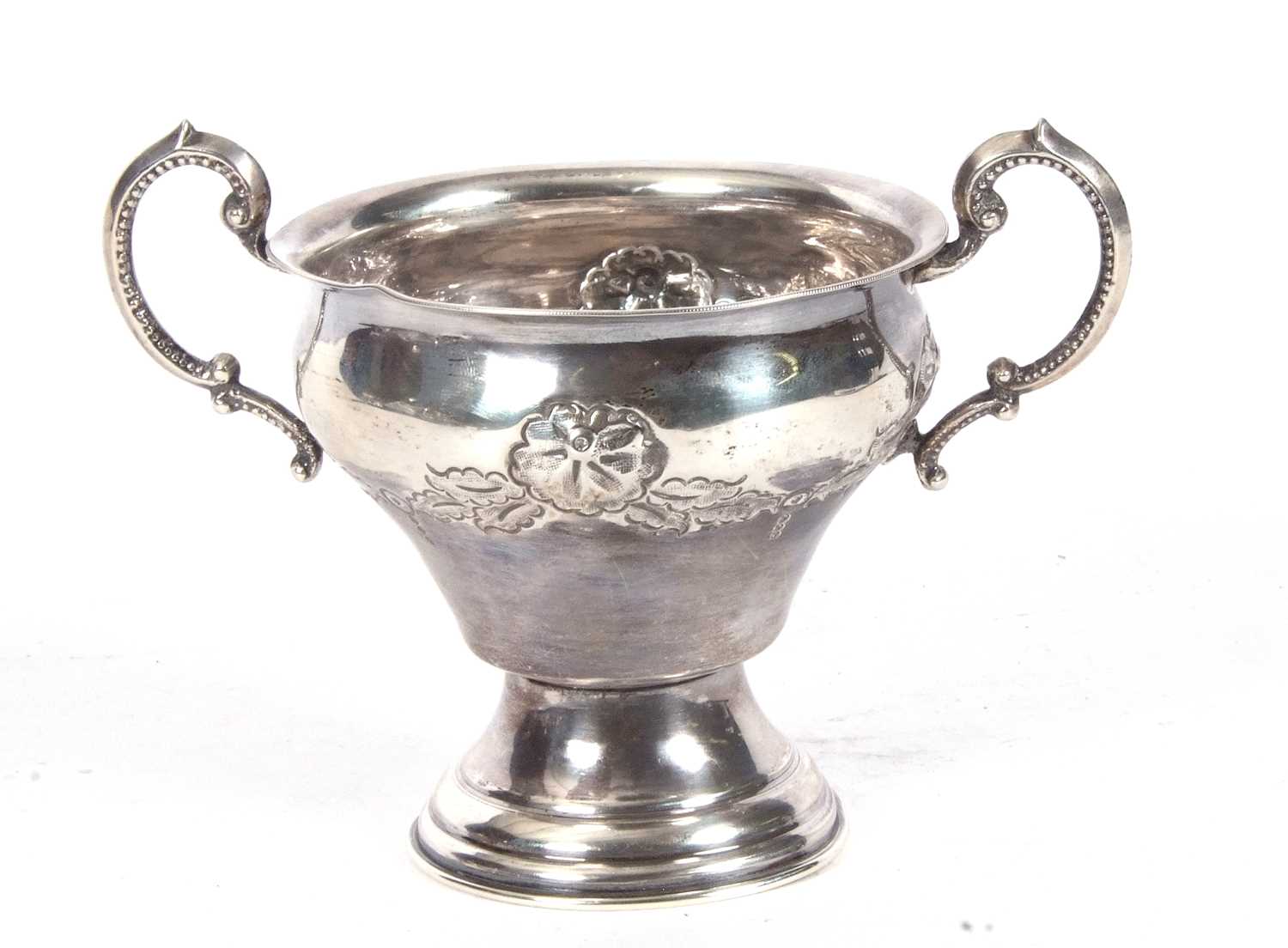 George V silver twin handled vase of baluster form, the body decorated with a garland of flowers and - Image 4 of 4