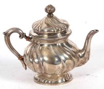 German white metal wrythen and fluted small teapot, stamped beneath 800, 265gms